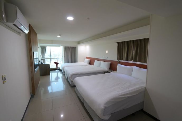 Imagen de la habitación del Hotel Yidianyuan Hotel. Foto 14