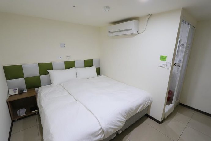 Imagen de la habitación del Hotel Yidianyuan Hotel. Foto 15