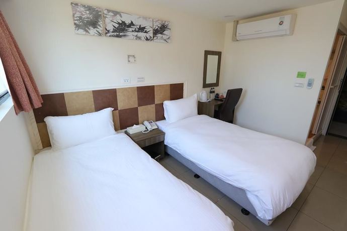 Imagen de la habitación del Hotel Yidianyuan Hotel. Foto 16