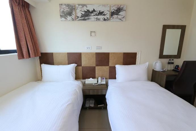 Imagen de la habitación del Hotel Yidianyuan Hotel. Foto 18