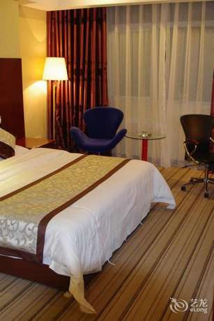 Imagen de la habitación del Hotel Yihai International Business Hotel. Foto 7