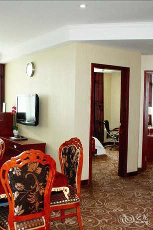 Imagen de la habitación del Hotel Yihai International Business Hotel. Foto 10