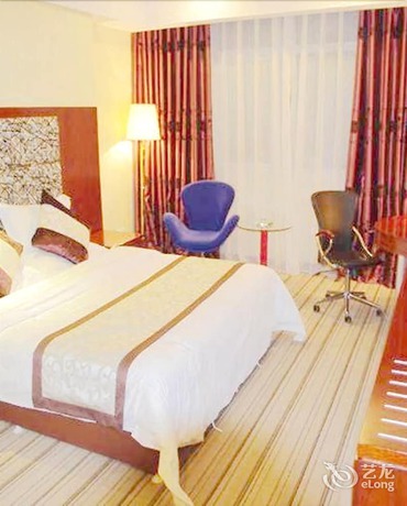 Imagen de la habitación del Hotel Yihai International Business Hotel. Foto 13