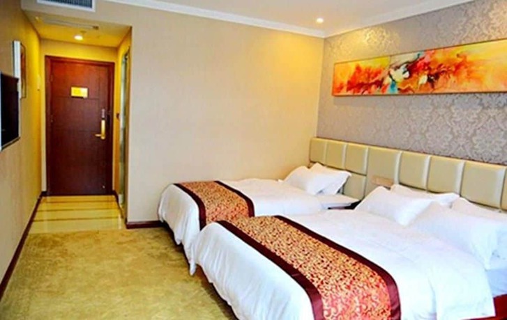 Imagen de la habitación del Hotel Yihaige Culture Hotel. Foto 6