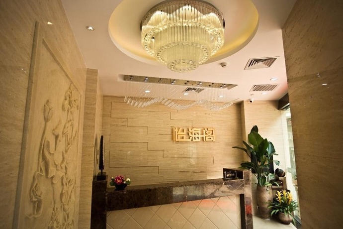 Imagen de la habitación del Hotel Yihaige Culture Hotel. Foto 9