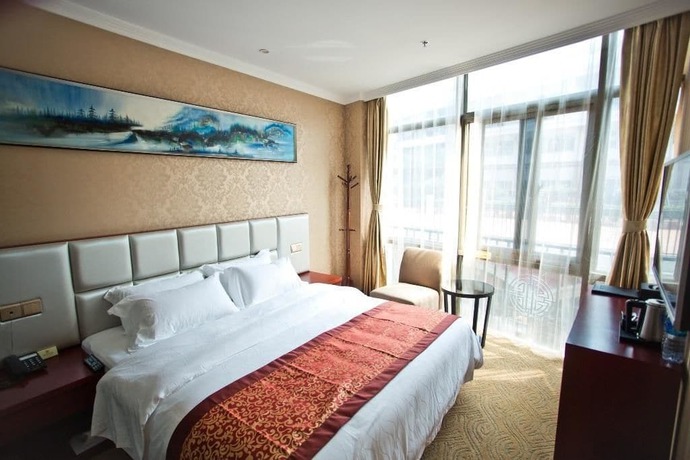 Imagen de la habitación del Hotel Yihaige Culture Hotel. Foto 16