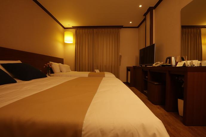 Imagen de la habitación del Hotel Yihua Hotel. Foto 3