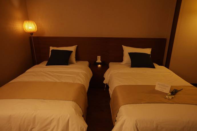 Imagen de la habitación del Hotel Yihua Hotel. Foto 6