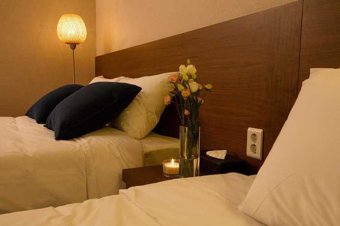 Imagen de la habitación del Hotel Yihua Hotel. Foto 7