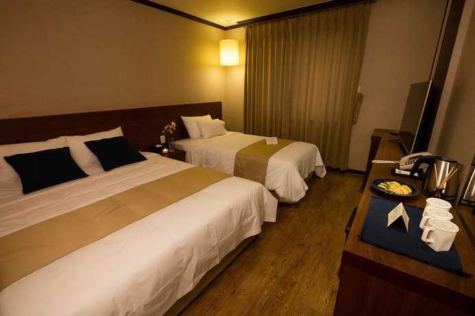 Imagen de la habitación del Hotel Yihua Hotel. Foto 10