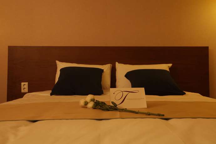 Imagen de la habitación del Hotel Yihua Hotel. Foto 14