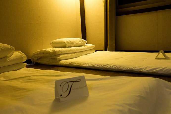 Imagen de la habitación del Hotel Yihua Hotel. Foto 17