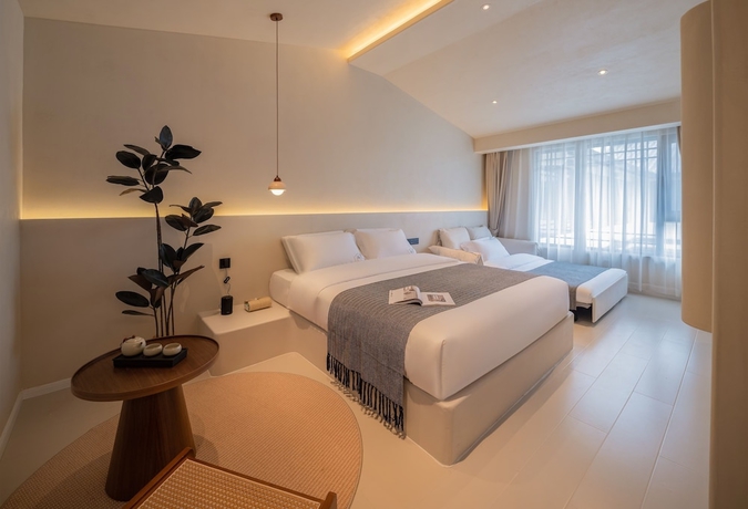 Imagen de la habitación del Hotel Yijianju Garden Inn. Foto 2