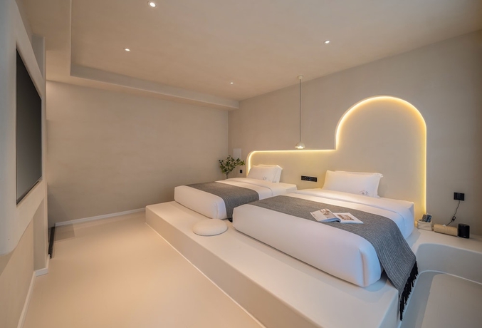 Imagen de la habitación del Hotel Yijianju Garden Inn. Foto 5