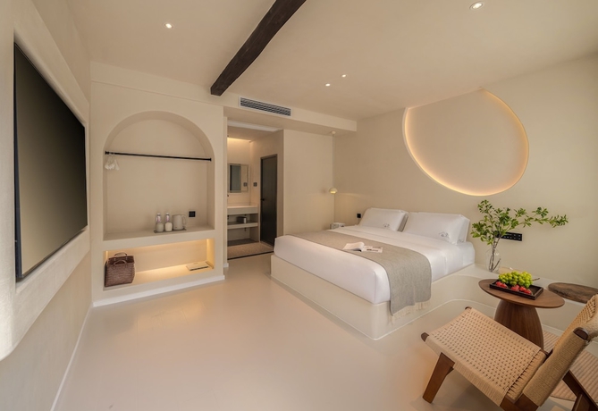 Imagen de la habitación del Hotel Yijianju Garden Inn. Foto 8
