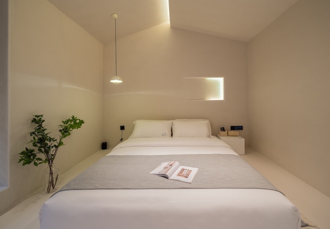 Imagen de la habitación del Hotel Yijianju Garden Inn. Foto 13