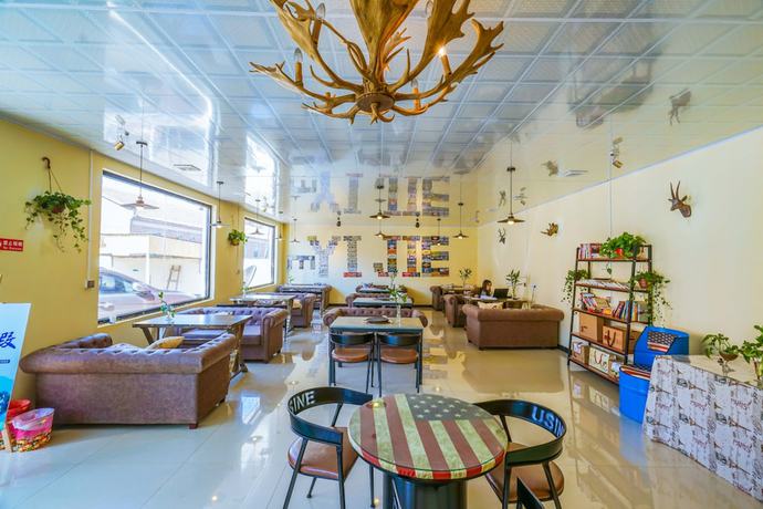 Imagen del bar/restaurante del Hotel Yijie Holiday Fengning Datan. Foto 4