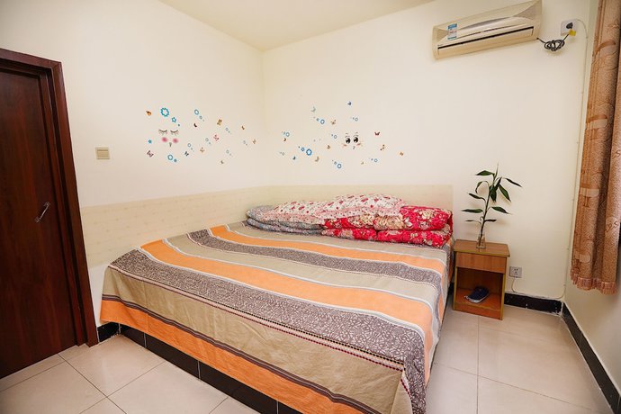 Imagen de la habitación del Hotel Yijie Holiday Huairou Shentangyu. Foto 12