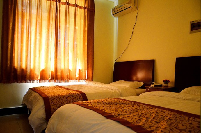 Imagen de la habitación del Hotel Yijie Holiday Huairou Shentangyu. Foto 14