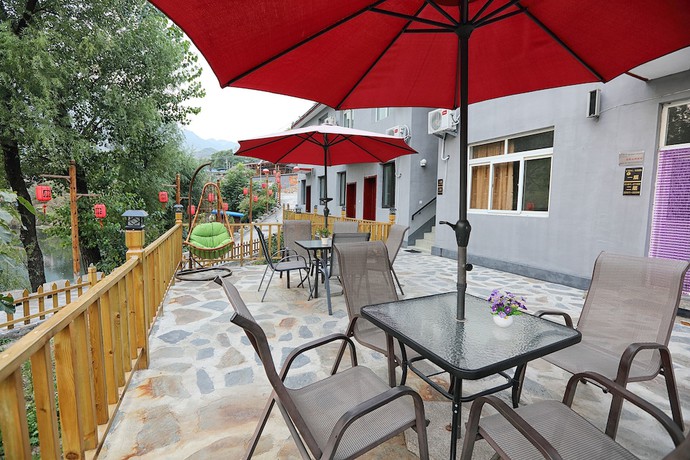 Imagen de los exteriores del Hotel Yijie Holiday Huairou Shentangyu. Foto 18
