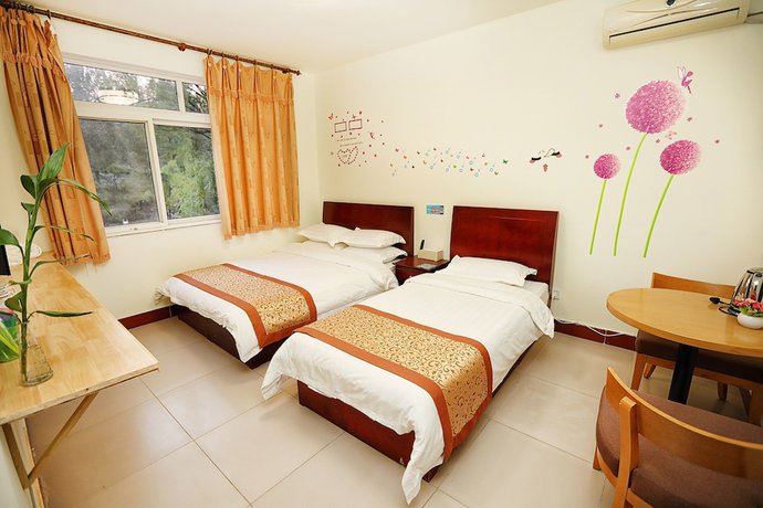 Imagen de la habitación del Hotel Yijie Holiday Huairou Shentangyu. Foto 16