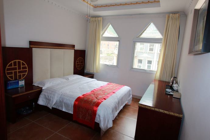 Imagen de la habitación del Hotel Yijie Holiday Miyun Longxi. Foto 6