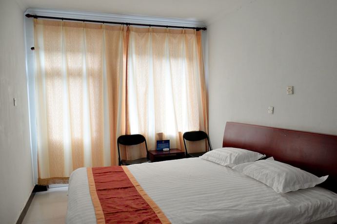 Imagen de la habitación del Hotel Yijie Holiday Miyun Longxi. Foto 13