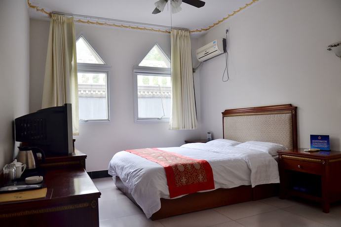 Imagen de la habitación del Hotel Yijie Holiday Miyun Longxi. Foto 18