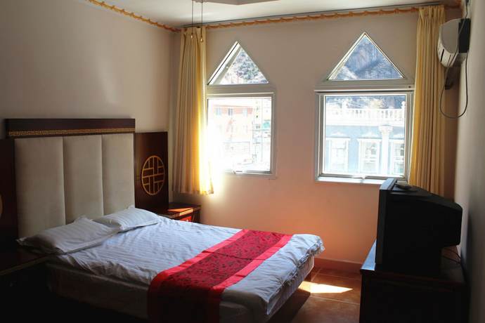 Imagen de la habitación del Hotel Yijie Holiday Miyun Longxi. Foto 19