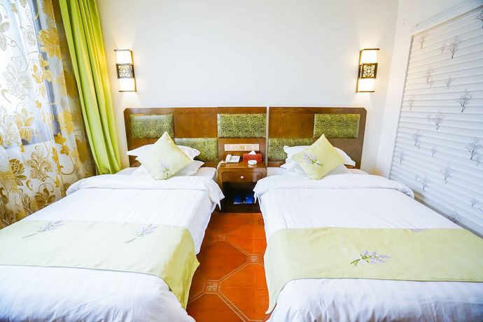 Imagen de la habitación del Hotel Yijie Holiday Taierzhuang Old Town. Foto 5