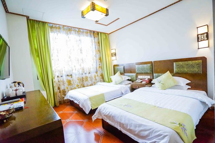 Imagen de la habitación del Hotel Yijie Holiday Taierzhuang Old Town. Foto 6