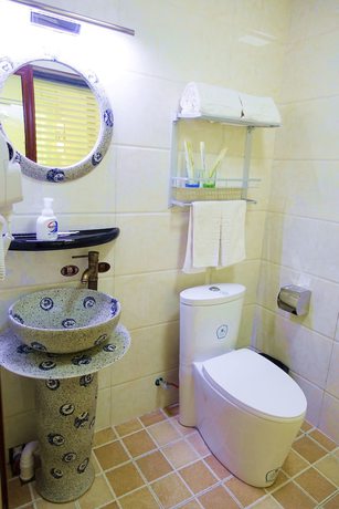 Imagen de la habitación del Hotel Yijie Holiday Taierzhuang Old Town. Foto 8