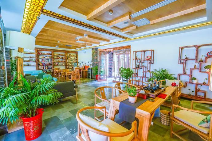 Imagen del bar/restaurante del Hotel Yijie Holiday Taierzhuang Old Town. Foto 3