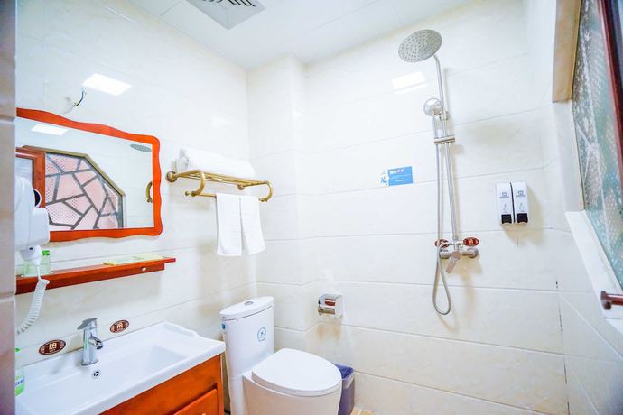 Imagen de la habitación del Hotel Yijie Holiday Taierzhuang Old Town. Foto 9