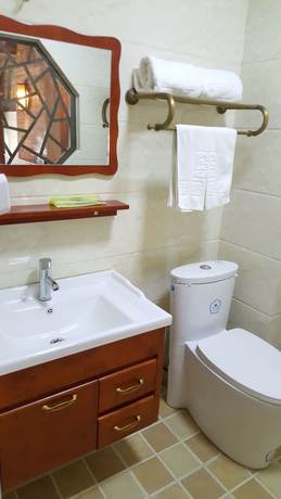 Imagen de la habitación del Hotel Yijie Holiday Taierzhuang Old Town. Foto 10