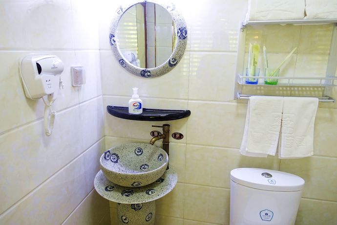 Imagen de la habitación del Hotel Yijie Holiday Taierzhuang Old Town. Foto 11