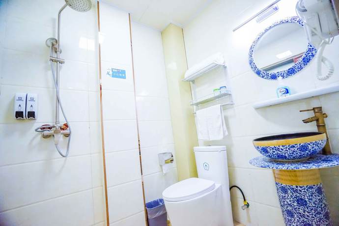 Imagen de la habitación del Hotel Yijie Holiday Taierzhuang Old Town. Foto 12