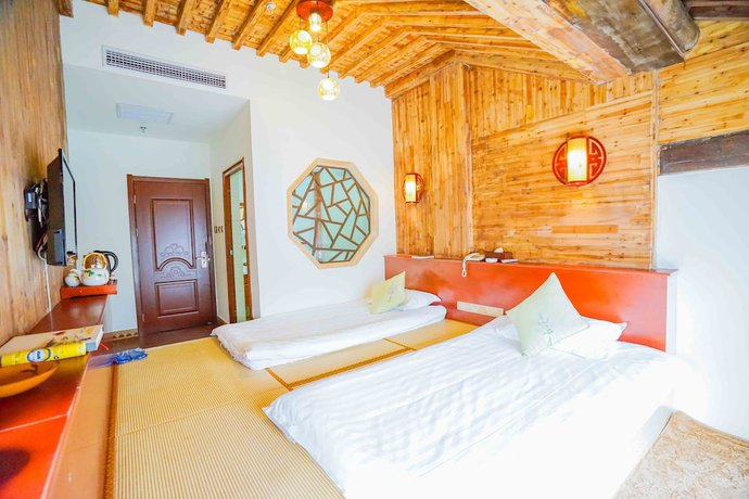 Imagen de la habitación del Hotel Yijie Holiday Taierzhuang Old Town. Foto 13