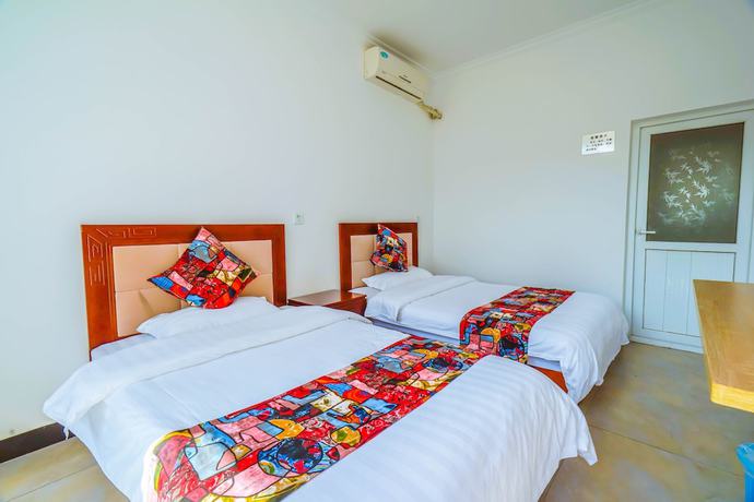 Imagen de la habitación del Hotel Yijie Holiday Water GreatWall No.1. Foto 6