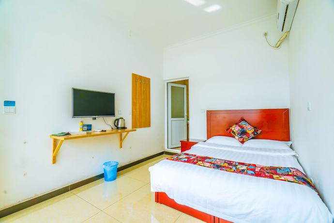 Imagen de la habitación del Hotel Yijie Holiday Water GreatWall No.1. Foto 7