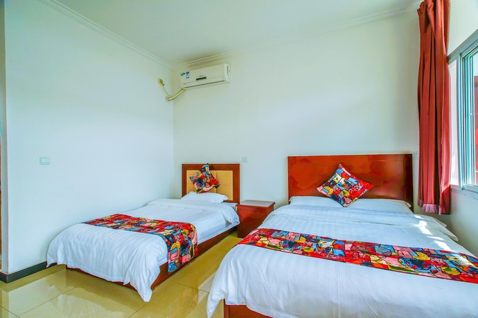 Imagen de la habitación del Hotel Yijie Holiday Water GreatWall No.1. Foto 9