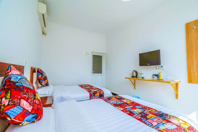 Imagen de la habitación del Hotel Yijie Holiday Water GreatWall No.1. Foto 10