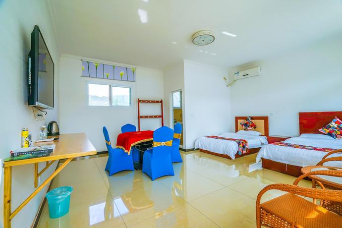 Imagen de la habitación del Hotel Yijie Holiday Water GreatWall No.1. Foto 11