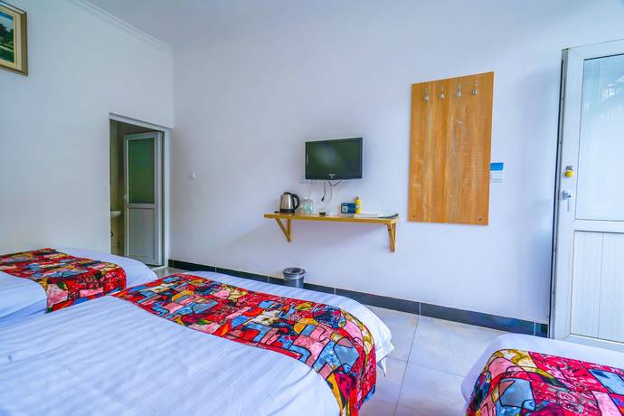 Imagen de la habitación del Hotel Yijie Holiday Water GreatWall No.1. Foto 12