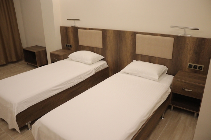 Imagen de la habitación del Hotel Yilgin Otel. Foto 6