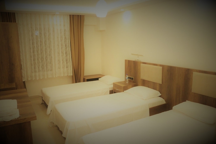 Imagen de la habitación del Hotel Yilgin Otel. Foto 9