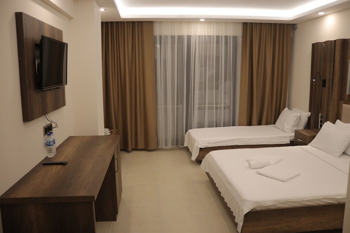 Imagen de la habitación del Hotel Yilgin Otel. Foto 11