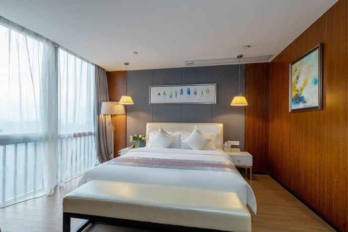 Imagen de la habitación del Hotel Yimi Apartment Jie Deng Du Hui Branch. Foto 11