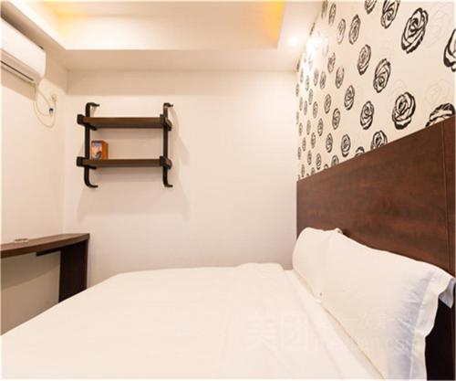 Imagen de la habitación del Hotel Yimi Guangzhou Exhibition Center. Foto 5