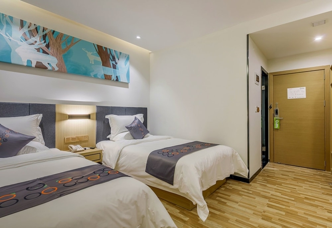 Imagen de la habitación del Hotel Yimi Inn Guangzhou Changdi Branch. Foto 13